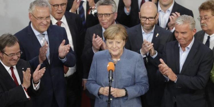 angela merkel fourth time chancellor
